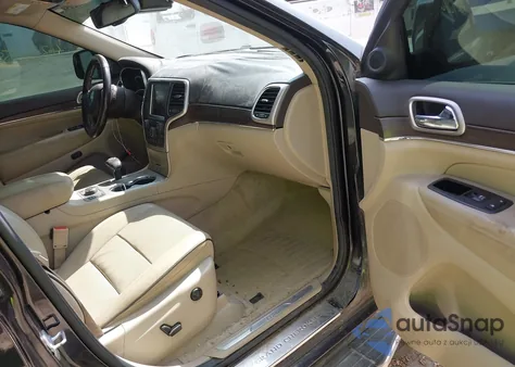 2014 Jeep Grand Cherokee Overland из США, поврежденный, VIN 1C4RJFCT9EC209899